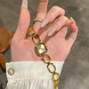 GEDI Women's Watch Fashion Gold Hollow Strap Quartz Niche Light Luxury Vintage Casual Square Dial Female Wrist Watch Gifts